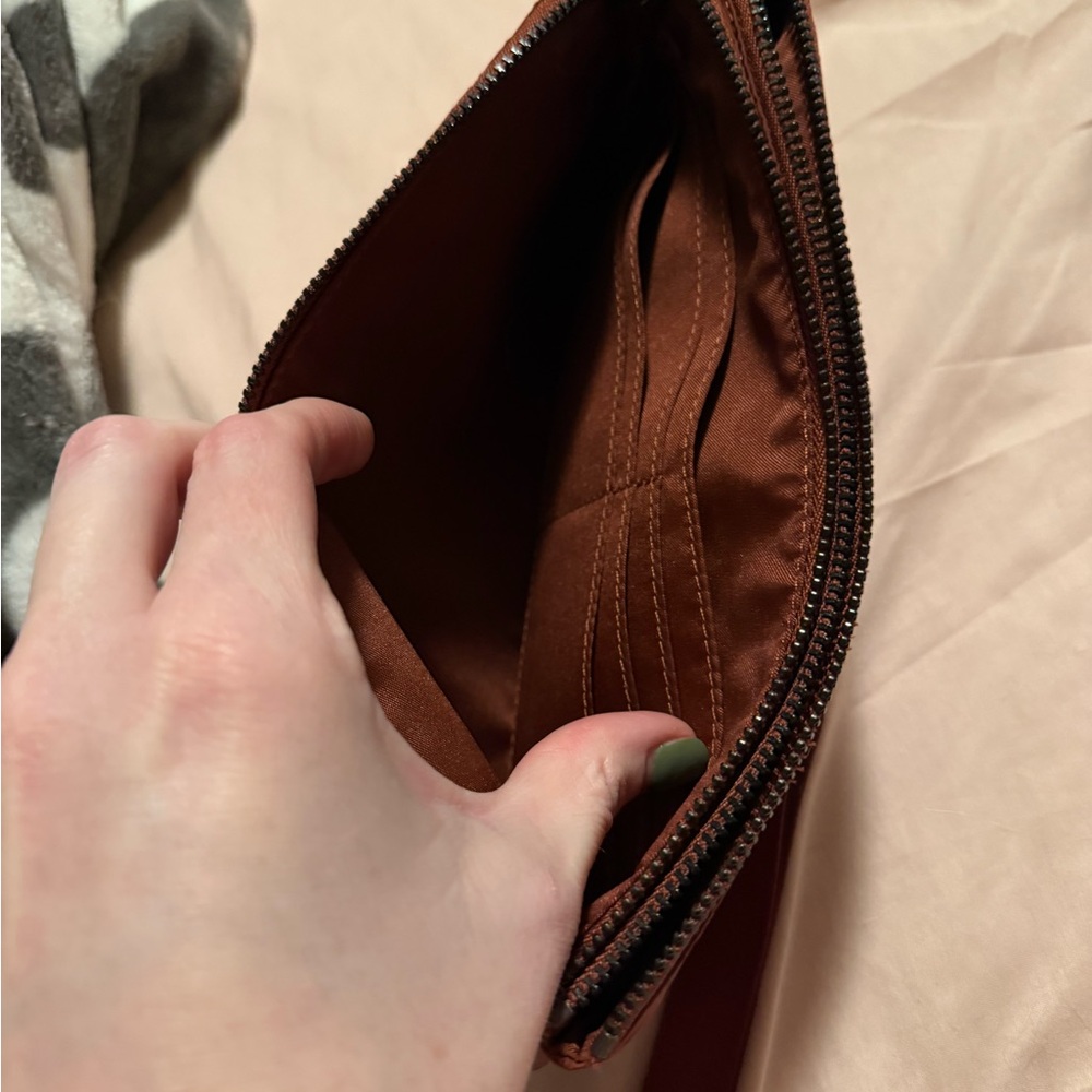 Lululemon Athletica orange/rust wristlet - Picture 4 of 4